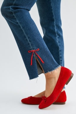 Dark denim bow slice denim jean